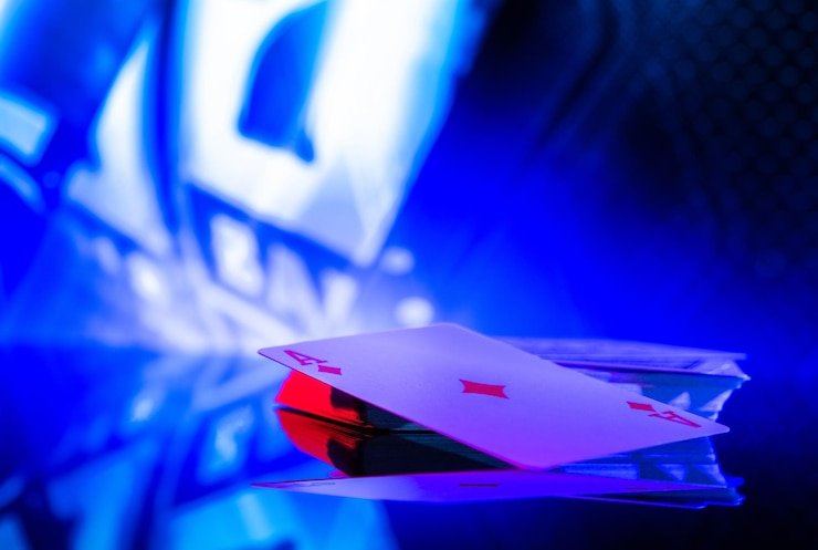 Antarmuka aplikasi mobile badai100 menampilkan meja dealer langsung dan menu sportsbook